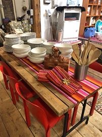 Flip open this easy pop up table when needed, and it is paired with some Vico Magistretti Chairs for some international class.  (And check out this set of heavy duty dinnerware - Dinnerparty!)
