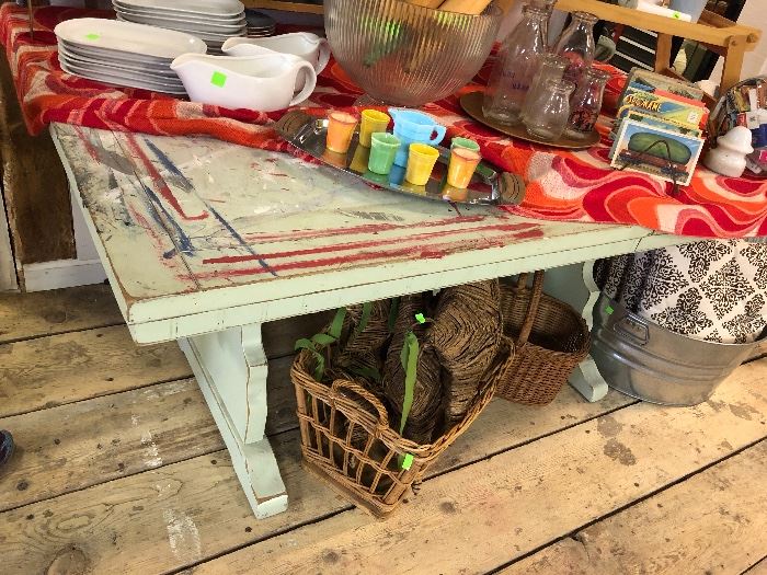 This sturdy paint table has great charm, but would also be a cool expandable dining table