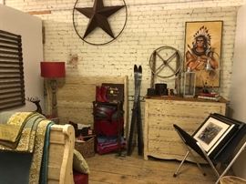 The bedroom area feels a little Ralph Lauren-ish.... But with some vintage treats