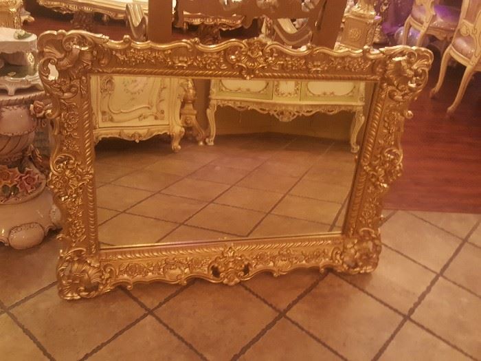Large gold carved mirror