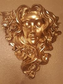 Large gold wall decor of girl