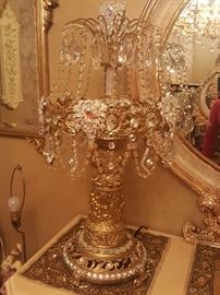 Chandelier lamp with multi colored crystal very heavy with cherubs carved into it