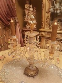 I have a pair of Crystal candelabras with multi colored crystal