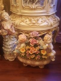 Large Capodimonte porcelain cherubs with floral centerpiece