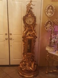 Antique grandfather clock with wind key