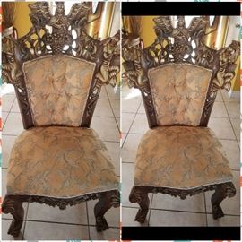 I have a pair of antique carved chairs from Persia