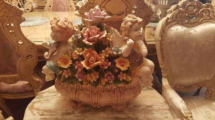 Capodimonte centerpiece with cherubs on floral ceramic
