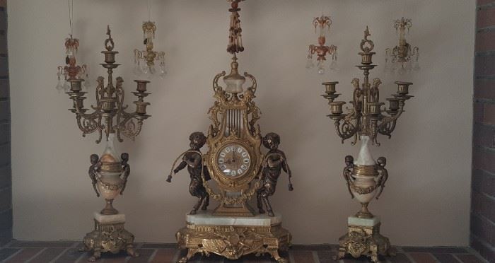 Three-piece antique clock set with candelabras
