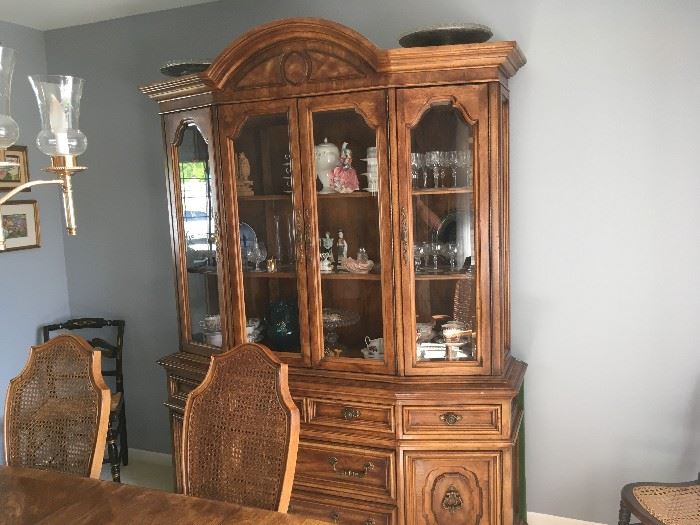 This is a high-end china cabinet bought together with table and chairs for several thousand when new -- it is in excellent condition.