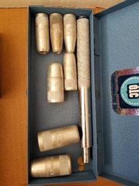 metal stamps and pipe measuring tools