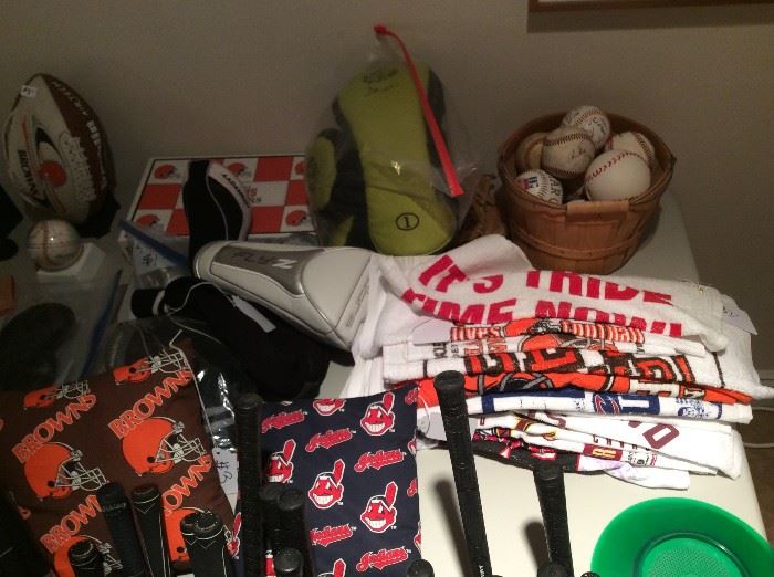 more sports items from fan towels, mini baseball bats, baseballs, signed Bob Feller baseball along with other signed ball, and a great collection of newer women's golf clubs