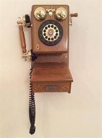 antique style phone along with other phones for sale