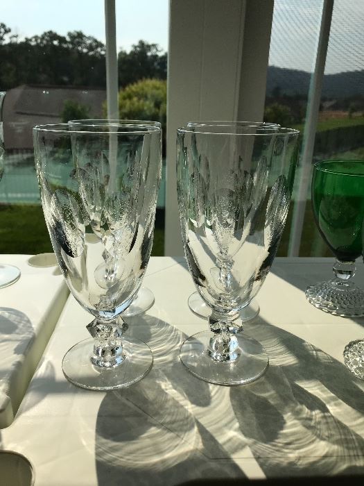Four vintage water/tea glasses with engraving.