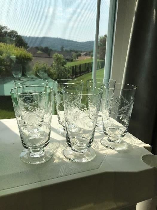 Six engraved footed crystal water/tea glasses.