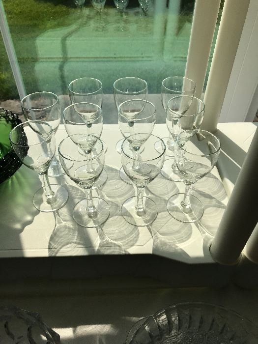 Eleven small wine or claret glasses.