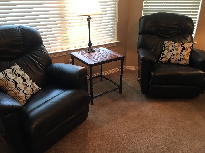 Matching brown leather la-z-boy recliners in perfect condition. 