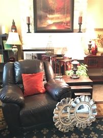 Another set of very nice comfy leather recliners in great condition. This photo also features a set of mirrored wall art, nesting tables, nice lamps & artwork . 