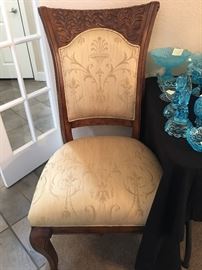 There are 8 matching chairs - lovely, elegant details! 