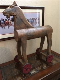 Pottery Barn wood horse on wheels - antique inspiration! 