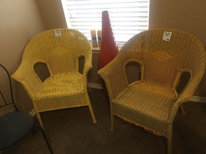 Painted yellow rattan chairs from pier one.