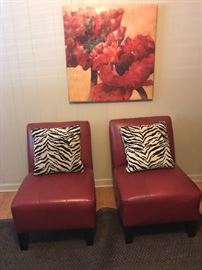 Red slipper chairs and pillows 