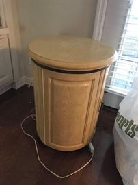 #29 round end table w door 20x26 as is laminate $65.00