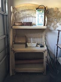 #27 wicker baker rack 3 shelves 36x19x72 $100.00
