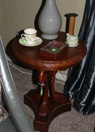 The beautiful walnut round swan table.