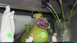 More items on the glass shelves in dining room.