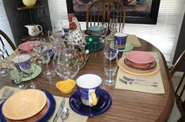 The everyday china on the table in breakfast room.