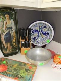 Just a few of the items on kitchen counter with a old coke metal tray.