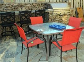 The  rest of the kitchen area with patio set.