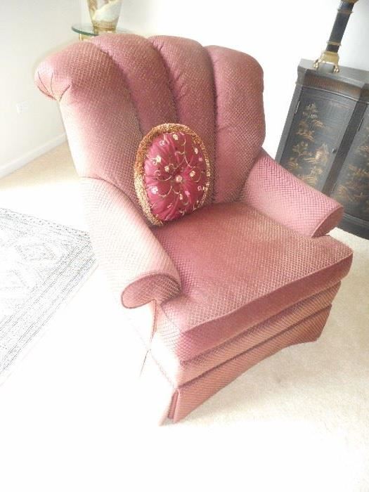 good size upholstered arm chair, in cranberry color with gold