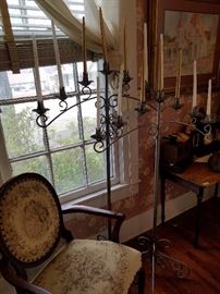 There are three chandeliers in different sizes