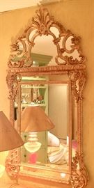 21. Pair of GIlt Highly Carved Beveled Mirrors (33'' x 64'')