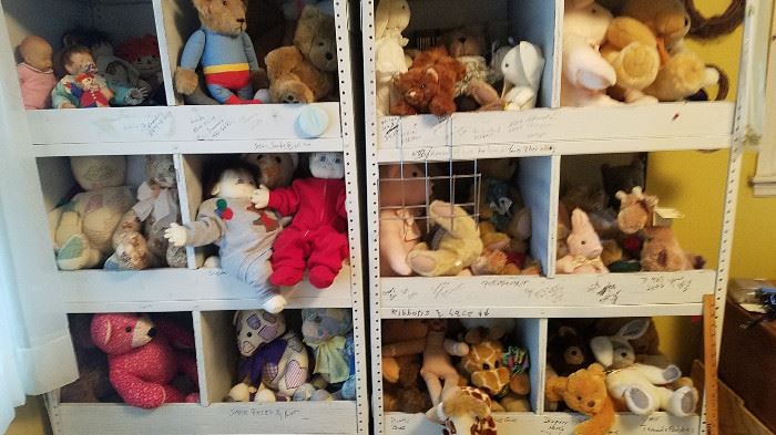 large collection of hand-made bears and other stuffed animals