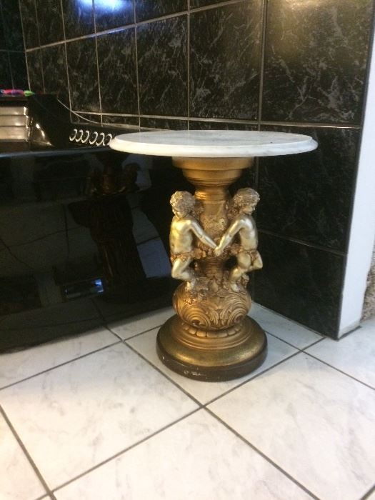Small table with cherubs