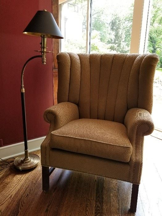 Camel Upholstered Wing Chair	37w x 36d x 44h (21h)
Chapman brass floor lamp with black shade	55h x 22w