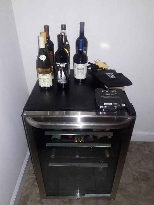 Frigidaire wine fridge and bottles...