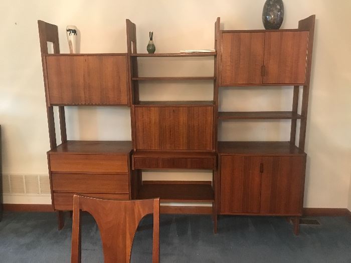 Teak Wall Unit...quite beautiful!  Bottom right has separators for albums. Key included for locking portions of the unit.