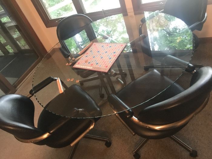 4 Chromcraft Swivel Chairs with Glass Top Table. Not that old but superb quality and condition.
