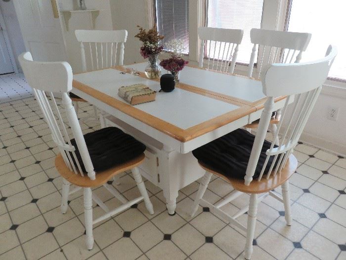 Tile top kitchen table with storage and five chairs. (A 6th chair needs some repair)
