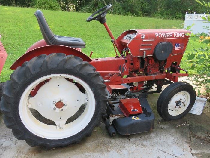 1979 Power King tractor with 52" mower.  3 speeds forward, 1 reverse,  PTO on the front, 18 horse kohler engine