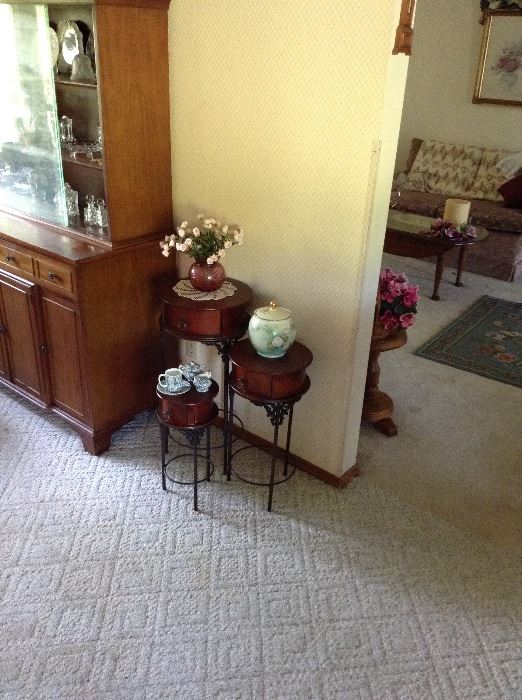 Nesting tables, China closet, and glassware.
