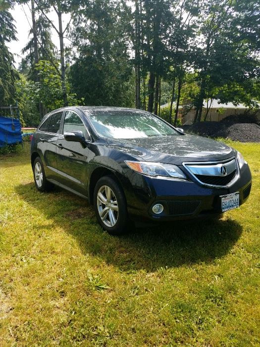 2015 Acura RDX sport utility vehicle in excellent condition  with only 27,000 miles asking $24,250. 