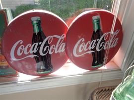 Lots of tin signs, some vintage, some new