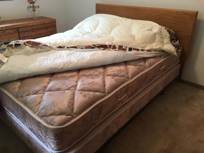 Queen bed, oak headboard, Sealy Posturepedic mattress and box springs; like new