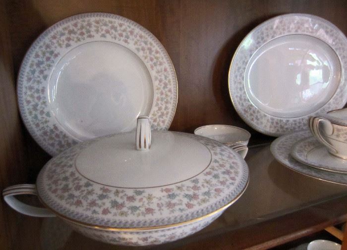 Twelve places settings and serving pieces of Noritake china "Sharlene" pattern