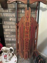 One of two vintage sleds
