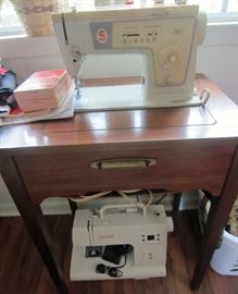 Two Singer sewing machines